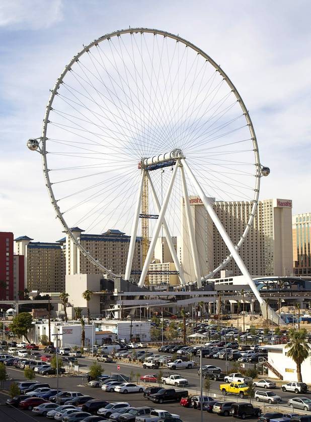 Cabins are shown attached to the 550-foot tall High Roller, the world's tallest observation wheel, under construction near the Las Vegas Strip and Flamingo Road Thursday, Nov. 7, 2013. The wheel is the centerpiece of the Linq project, a $550 million outdoor retail, dining and entertainment district being developed by Caesars Entertainment Corp. The High Roller will feature 28 cabins that will each hold 40 passengers.