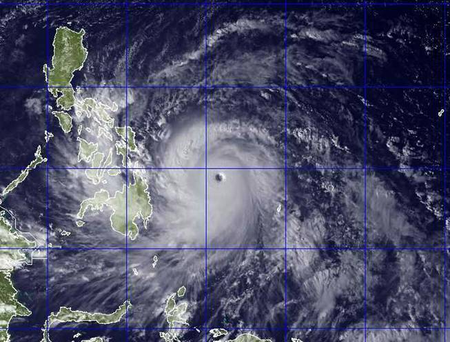 This image provided by the U.S. Naval Research Lab shows Typhoon Haiyan taken by the NEXSAT satellite Thursday Nov. 7, 2013 at 2:30 a.m. EDT. Gorvernment forecasters said Thursday that Typhoon Haiyan was packing sustained winds of 215 kilometers (134 miles) per hour and ferocious gusts of 250 kph (155 mph) and could pick up strength over the Pacific Ocean before it slams into the eastern Philippine province of Eastern Samar on Friday.