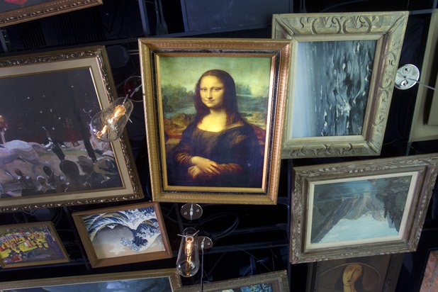Replicas of famous paintings cover the ceiling of the Art Bar in the Downtown Grand Monday, Nov. 11, 2013.