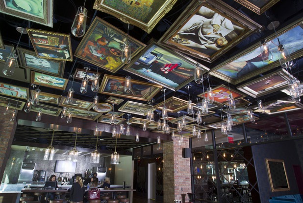 Replicas of famous paintings cover the ceiling of the Art Bar in the Downtown Grand Monday, Nov. 11, 2013.