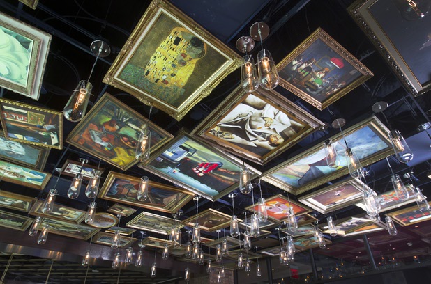 Replicas of famous paintings cover the ceiling of the Art Bar in the Downtown Grand Monday, Nov. 11, 2013.