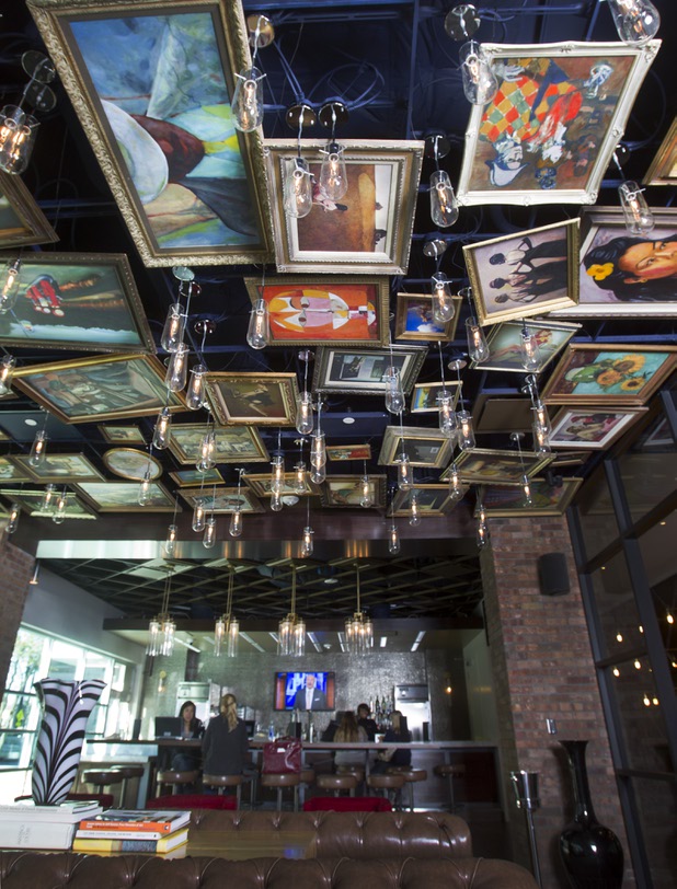 Replicas of famous paintings cover the ceiling of the Art Bar in the Downtown Grand Monday, Nov. 11, 2013.