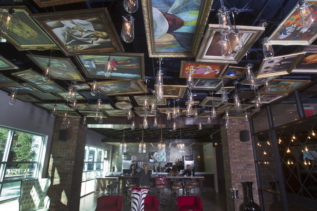 Replicas of famous paintings cover the ceiling of the Art Bar in the Downtown Grand Monday, Nov. 11, 2013.