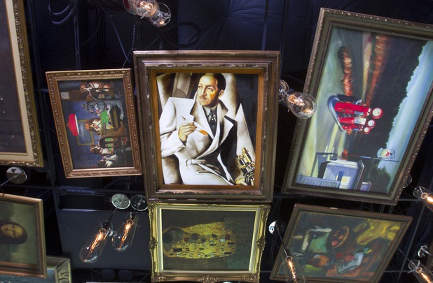 Replicas of famous paintings cover the ceiling of the Art Bar in the Downtown Grand Monday, Nov. 11, 2013.