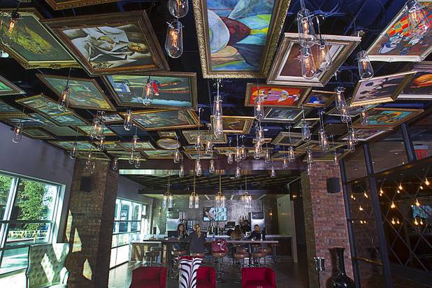 Replicas of famous paintings cover the ceiling of the Art Bar in the Downtown Grand Monday, Nov. 11, 2013.