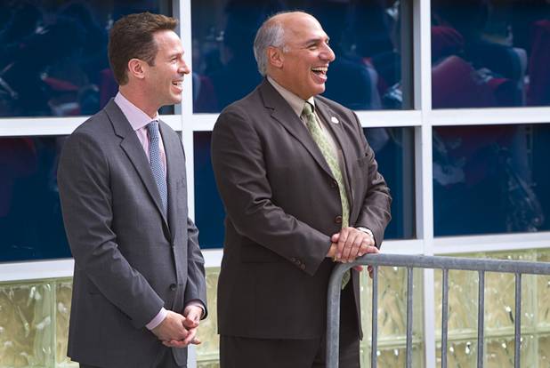 Seth Schorr, left, CEO of the Downtown Grand, and Las Vegas City Councilman Stavros Anthony, smile during an official opening ceremony for the Downtown Grand in downtown Las Vegas Tuesday, Nov. 12, 2013.