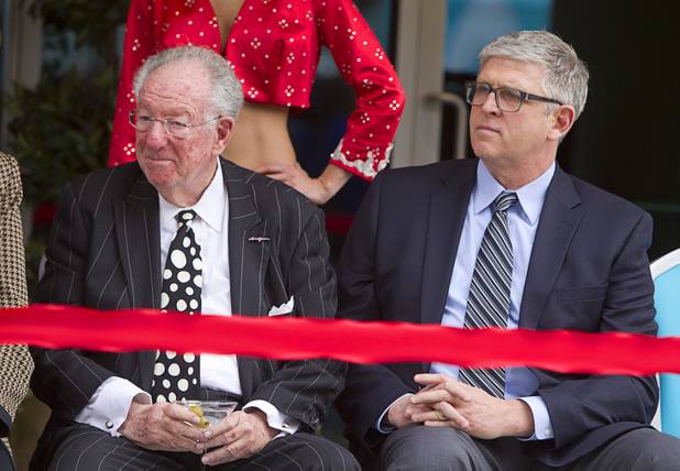 Former Las Vegas Mayor Oscar Goodman and Bill Doak, first vice president at CIM Group, listen to speakers during an official opening ceremony for the Downtown Grand in downtown Las Vegas Tuesday, Nov. 12, 2013.