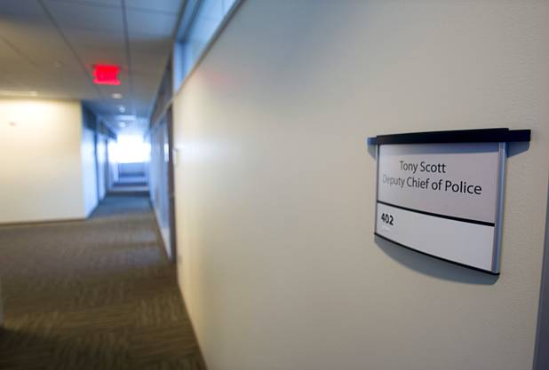 A name plaque is shown by a door on the fourth floor of the North Las Vegas City Hall Tuesday, Nov. 12, 2013. The floor was designed to house the North Las Vegas Police Department but is currently vacant.