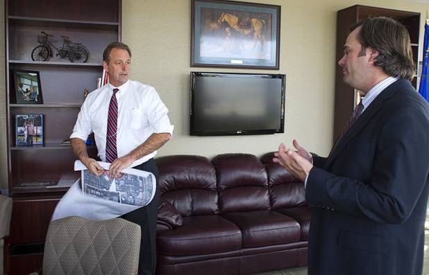 North Las Vegas Mayor John Lee talks with Ryann Juden, intergovernmental affairs/chief of staff, in his office at North Las Vegas City Hall Tuesday, Nov. 12, 2013.
