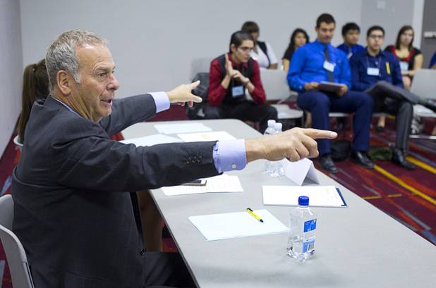 Brian Greenspun, publisher and editor of the Las Vegas Sun, moderates a discussion during the annual Las Vegas Sun Youth Forum at the Las Vegas Convention Center Wednesday, Nov. 13, 2013.