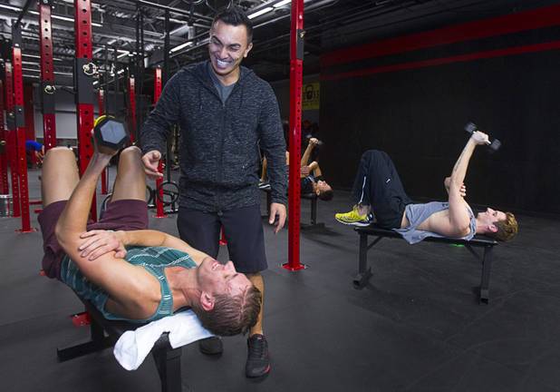 Dancers from the Jubilee! show, from left, Caleb Draper, Nathaniel Burich, and Patrick Leahy, take a Fit Camp class from trainer/owner Boris Sapone at the Colosseum Training Center, in the Cashman Equipment complex on St. Rose Parkway, Thursday, Nov. 14, 2013. The dancers take a CrossFit class in the morning and the Fit Camp in the evening, they said.