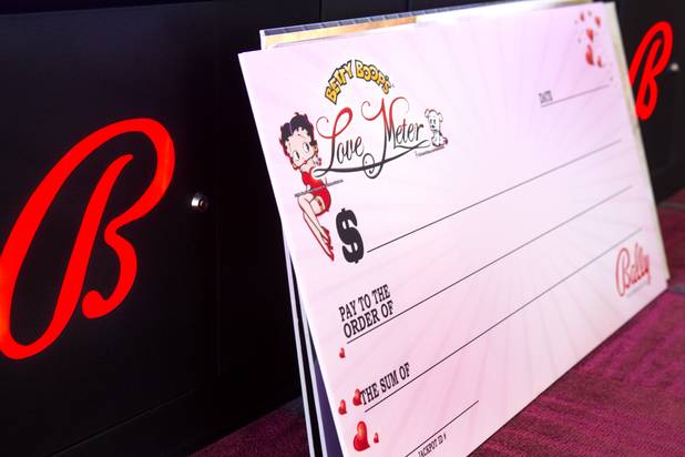 A oversized check for the Bally Technologies' Betty Boop slot machines is shown at the company Thursday, Nov. 14, 2013. A Jackpot Response Team member is always on call in the event that a gambler hits a progressive jackpot on a Bally Technologies slot machine.