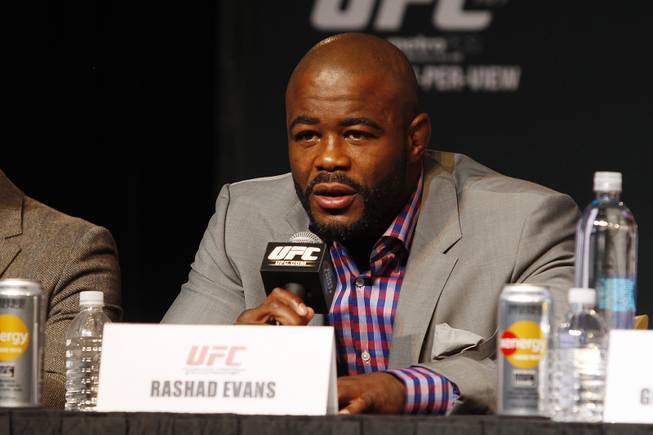 Rashad Evans answers a question during a news conference Thursday, Nov. 14, 2013 in advance of UFC 167.