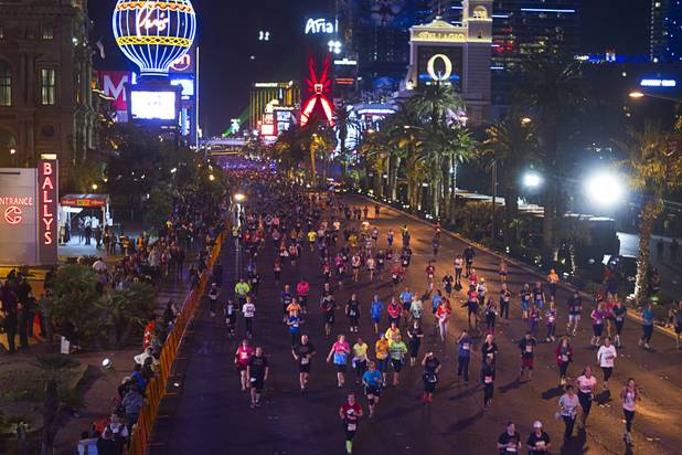 Runners head north on the Las Vegas Strip near Flamingo Road during the 5th annual Rock 'n' Roll Las Vegas Marathon Sunday, Nov. 17, 2013.