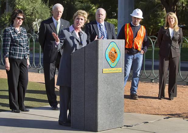 Clark County Commissioner Chris Giunchigliani speaks during a groundbreaking ceremony at the "Welcome to Fabulous Las Vegas" sign on Las Vegas Boulevard South Monday, Nov. 18, 2013. The groundbreaking was for a photovoltaic solar installation which will power the sign. Behind Giunchigliani, from left, are: Commissioner Mary Beth Scow, Hugh Sinnock of the Las Vegas Convention and Visitors Authority, Bob Stewart of NV Energy, Chris Brooks of Bombard Renewable Energy and Lydia Ball, executive director of the Clean Energy Project.