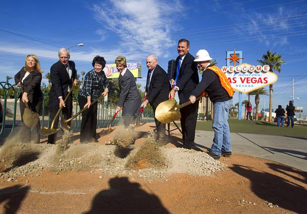 Officials take part in a groundbreaking ceremony at the "Welcome to Fabulous Las Vegas" sign on Las Vegas Boulevard South Monday, Nov. 18, 2013. From left, are: Lydia Ball, executive director of the Clean Energy Project, Hugh Sinnock of the Las Vegas Convention and Visitors Authority, Clark County Commissioner Mary Beth Scow, Commissioner Chris Giunchigliani, Bob Stewart of NV Energy, Rick Van Diepen, executive director of Green Chips and Chris Brooks of Bombard Renewable Energy. The groundbreaking was for a photovoltaic solar installation which will power the sign.