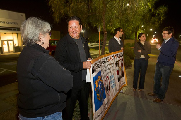 Mary Berkheiser, a UNLV law professor, talks with Carlos Silva, executive director of Immigration Reform For Nevada, outside the Henderson Detention Center Tuesday, Nov. 19, 2013. Protesters are concerned about a UNLV law clinic report that raises questions about the conditions for immigrants at the detention center.