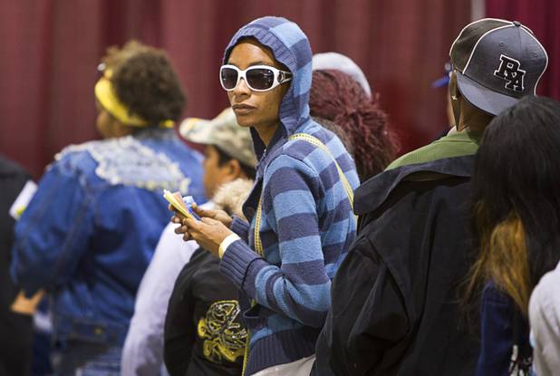 A woman waits in a line to Las Vegas Municipal and Justice courtrooms during the Fall 2013 Southern Nevada Project Homeless Connect at Cashman Field Center Tuesday, Nov. 19, 2013. Many people took advantage of the court services to take care of minor violations or warrants. The annual event brings together a variety of social and legal services to help homeless and low-income people.