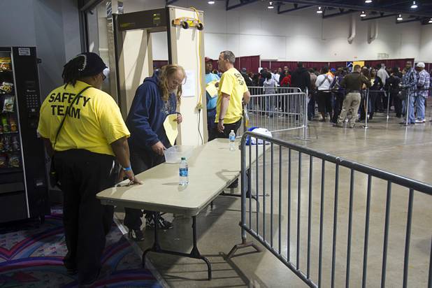 A man passes through security to Las Vegas Municipal and Justice courtrooms during the Fall 2013 Southern Nevada Project Homeless Connect at Cashman Field Center Tuesday, Nov. 19, 2013. Many people took advantage of the court services to take care of minor violations or warrants. The annual event brings together a variety of social and legal services to help homeless and low-income people.