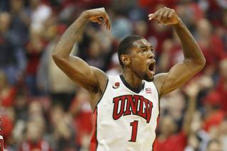 UNLV forward Roscoe Smith tries to get the crowd into their game against Arizona State Tuesday, Nov. 19, 2013 at the Thomas & Mack.
