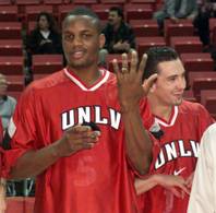 UNLV's Kevin Simmons (left) shows off his 1998 Western Athletic Conference tournament championship ring. Mark Dickel, the point guard on the title team, is at right.