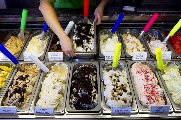 Chef Desyree G. Alberganti restocks a display case with Cookies & Cream gelato at the Art Of Flavors gelato shop, 1616 Las Vegas Boulevard South, Sunday, Nov. 24, 2013.