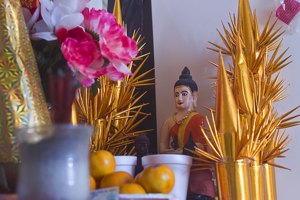 A Buddhist altar is displayed at Sothy Seang's Donut Hut, 3242 E Desert Inn Rd., Sunday, Nov. 24, 2013. Seang fought with the Cambodian army against the Viet Cong during the Vietnam War. He later immigrated to the U.S. He has owned the Donut Hut in Las Vegas for 22 years.