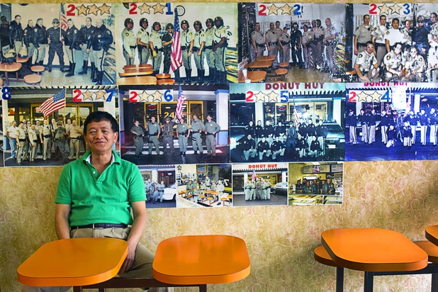 Sothy Seang, 57, takes a break during a slow time at the Donut Hut, 3242 E Desert Inn Rd., Sunday, Nov. 24, 2013. Seang fought with the Cambodian army against the Viet Cong during the Vietnam War. He later immigrated to the U.S. He has owned the Donut Hut in Las Vegas for 22 years.