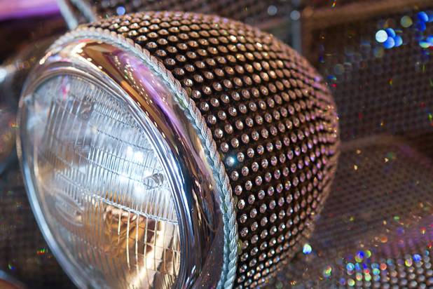 A  rhinestone-covered roadster, once owned by Liberace, is displayed in the Cosmopolitan Monday, Nov. 25, 2013. The display is part of "Too Much of a Good Thing Is Wonderful: Liberace and the Art of Costume" in the Cosmopolitan opened Monday and will run through Jan.1, 2014. Admission is free but any donations will benefit the Liberace Foundations scholarship fund.