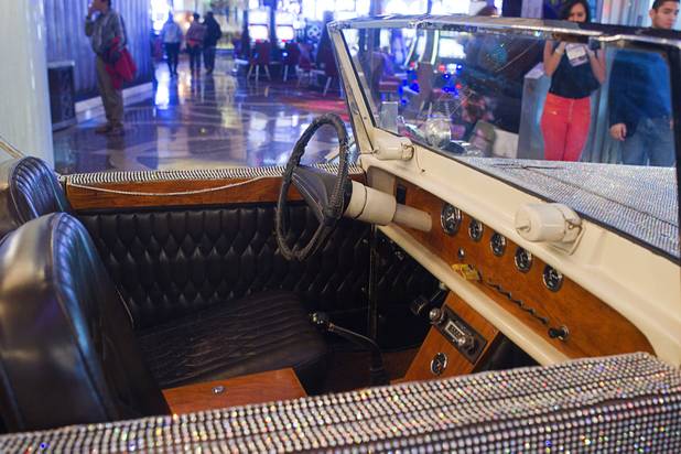 A  rhinestone-covered roadster, once owned by Liberace, is displayed in the Cosmopolitan Monday, Nov. 25, 2013. The display is part of "Too Much of a Good Thing Is Wonderful: Liberace and the Art of Costume" in the Cosmopolitan opened Monday and will run through Jan.1, 2014. Admission is free but any donations will benefit the Liberace Foundations scholarship fund.