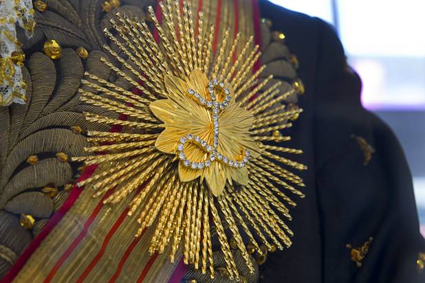A broach is shown on a Liberace costume at "Too Much of a Good Thing Is Wonderful: Liberace and the Art of Costume" in the Cosmopolitan Monday, Nov. 25, 2013. The exhibit opened Monday and will run through Jan.1, 2014. Admission is free but any donations will benefit the Liberace Foundations scholarship fund.