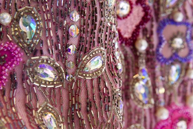 A detail of a Liberace costume is shown at "Too Much of a Good Thing Is Wonderful: Liberace and the Art of Costume" in the Cosmopolitan Monday, Nov. 25, 2013. The exhibit opened Monday and will run through Jan.1, 2014. Admission is free but any donations will benefit the Liberace Foundations scholarship fund.