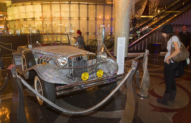 A  rhinestone-covered roadster, once owned by Liberace, is displayed in the Cosmopolitan Monday, Nov. 25, 2013. The display is part of "Too Much of a Good Thing Is Wonderful: Liberace and the Art of Costume" in the Cosmopolitan opened Monday and will run through Jan.1, 2014. Admission is free but any donations will benefit the Liberace Foundations scholarship fund.