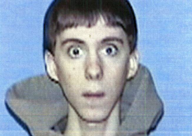 This undated file identification photo released Wednesday, April 3, 2013, by Western Connecticut State University in Danbury, Conn., shows former student Adam Lanza, who authorities said opened fire inside the Sandy Hook Elementary School in Newtown, Conn., on Friday, Dec. 14, 2012, killing 26 students and educators. Investigators released a report on the shooting Monday, Nov. 25, 2013, by the prosecutor overseeing the probe, State's Attorney Stephen Sedensky III.