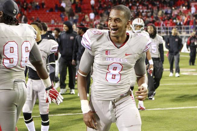 UNLV quarterback Caleb Herring smiles after defeating San Diego State 45-19 in their Mountain West Conference game Saturday, Nov. 30, 2013, at Sam Boyd Stadium.