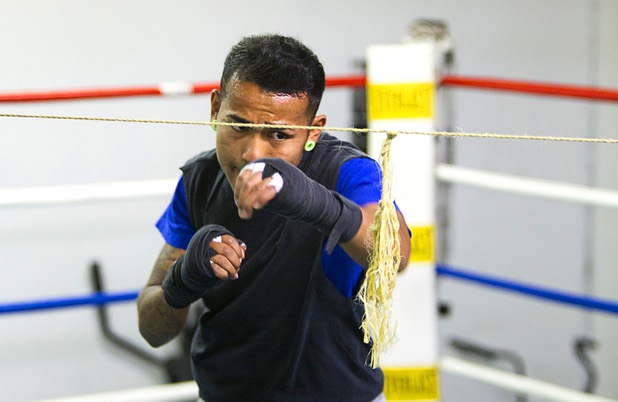 Boxer Yosigey Ramirez, 23, a graduate of Clark High School, shadow boxes during a workout at the Pochiro Boxing gym Tuesday, Dec. 3, 2013. Pochiro Boxing Promotions will hold a boxing card featuring local boxers at Sam's Town Friday.