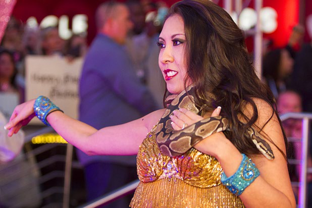 A dancer performs with a snake during an arrival ceremony for Britney Spears at Planet Hollywood on Tuesday, Dec. 3, 2013. Spears is making preparations for the debut of her two-year residency, “Britney: Piece of Me,” that is scheduled to begin at Planet Hollywood on Dec. 27. 