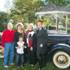 From left: John Miller, daughter Christi McKee, great grandson Rocco Mills, Ann Miller, grand daughter Erin Mills, pose for a photo in front of a 39 Ford at their family owned wedding venue the Secret Garden, Wednesday, Dec. 4, 2013.