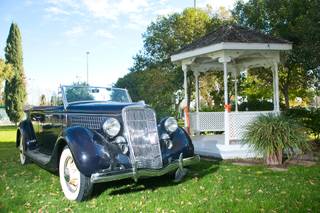 A 39 Ford is parked in front of a gazebo on the grounds of the Secret Garden wedding venue, Wednesday, Dec. 4, 2013.