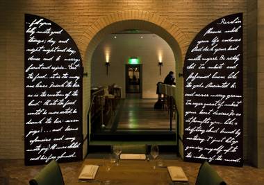 Laser-cut steel doors with illuminated lettering are a distinctive feature at the new restaurant Crush in MGM Grand pictured here on Friday, Dec. 6, 2013.