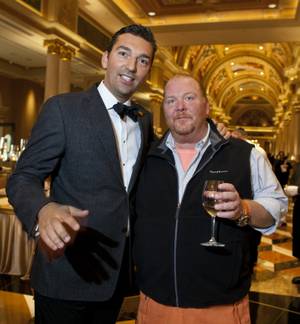 (From left) Vice president of food and beverage Sebastian Silversti stands with chef Mario Baltali before the start of La Cucina's Grand Banquet at the Venetian on Friday Dec. 6, 2013.