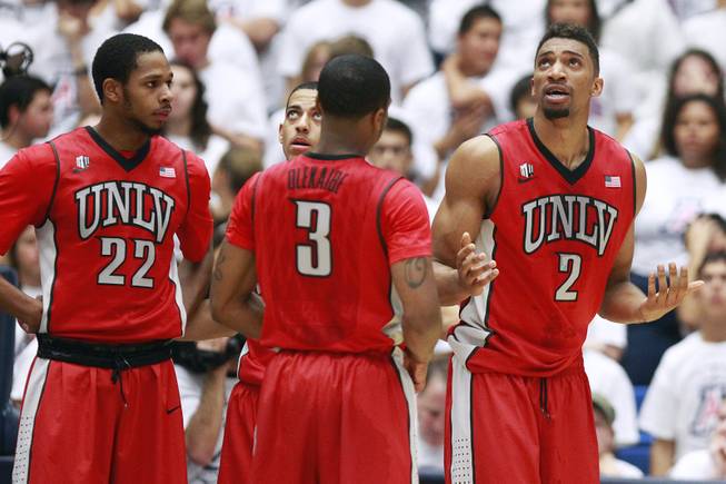 UNLV forward Khem Birch reacts after picking up his third foul in the first half of their game against Arizona at the McKale Center in Tucson Saturday, Dec. 7, 2013. Arizona won the game 63-58.
