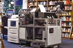 This is a machine that can print out your own book, with paperback cover, or any book sold by several publishers.