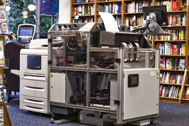 This is a machine that can print out your own book, with paperback cover, or any book sold by several publishers.