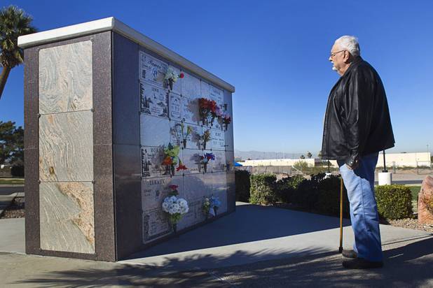 Frank Bower stands by an ashes wall at Palm Boulder Highway Mortuary & Cemetery in Henderson Wednesday, Dec. 11, 2013. After his wife Sandra Lee died in 2011, he had a portion of her ashes sent into space.