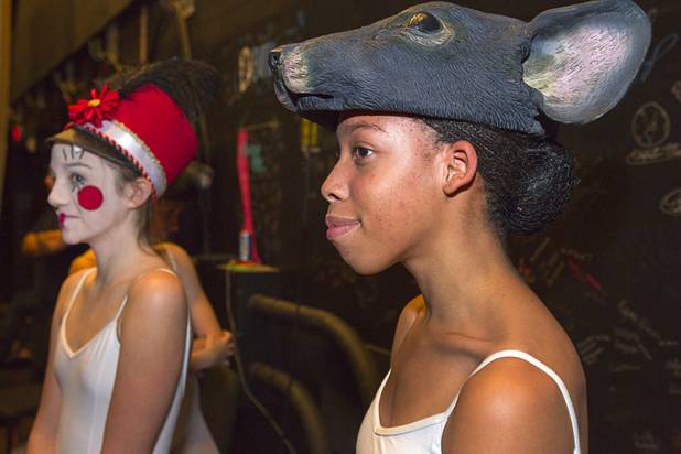 Toy solder Sydney Carrigan, 12, and mouse Jahisha Williams, 16, wait backstage during rehearsal for Nevada Ballet Theater’s “The Nutcracker” at the Smith Center for the Performing Arts on Wednesday, Dec. 11, 2013. The annual performance opens Saturday and runs through Dec. 22.
