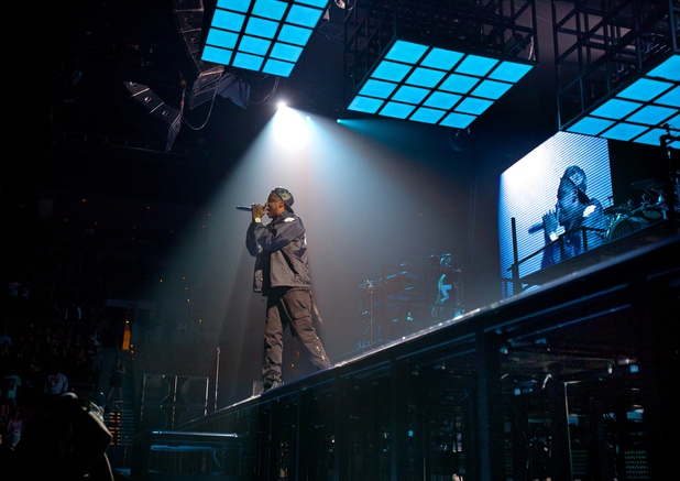 Jay Z performs under a spotlight at the Mandalay Bay Events Center on Friday, Dec. 13, 2013.