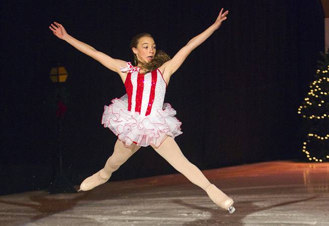 Hiannah Rodriguez jumps during the "Treasure of Christmas" holiday ice show at the Sobe Ice Arena at the Fiesta Rancho Sunday, Dec. 15, 2013. The annual program features local skaters. Admission was free with a donation of three canned goods which will be donated to the Salvation Army, organizers said.