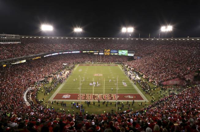 Fans at Candlestick Park watch an NFL game between the San Francisco 49ers and the Atlanta Falcons in San Francisco on Monday, Dec. 23, 2013.
