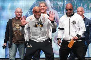 Former champion Anderson Silva jokes around while taking the stage during the weigh in for UFC 168 Friday, Dec. 27, 2013 at the MGM Grand Garden Arena.